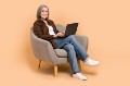 Full body size photo of sit comfort armchair woman grandmother learning new device modern netbook isolated over beige color background.